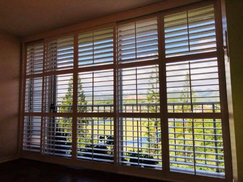 view of windows with installed blinds