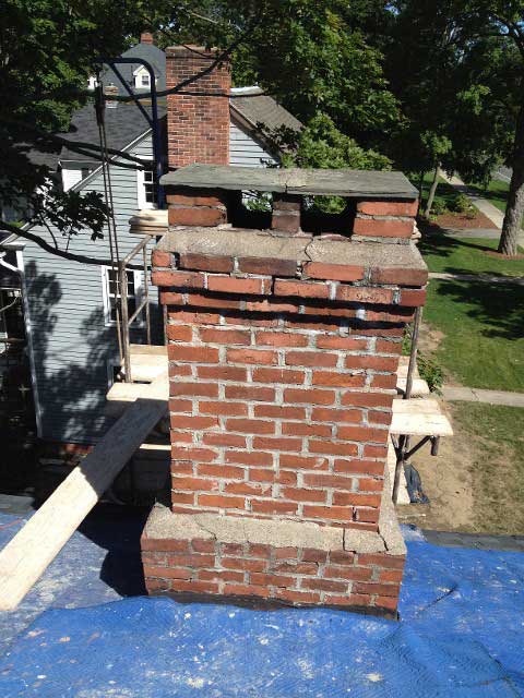 Small Chimney Under Construction – West Springfield, MA – Rolandini Brothers Masonry