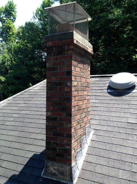 Roof with Chimney – West Springfield, MA – Rolandini Brothers Masonry
