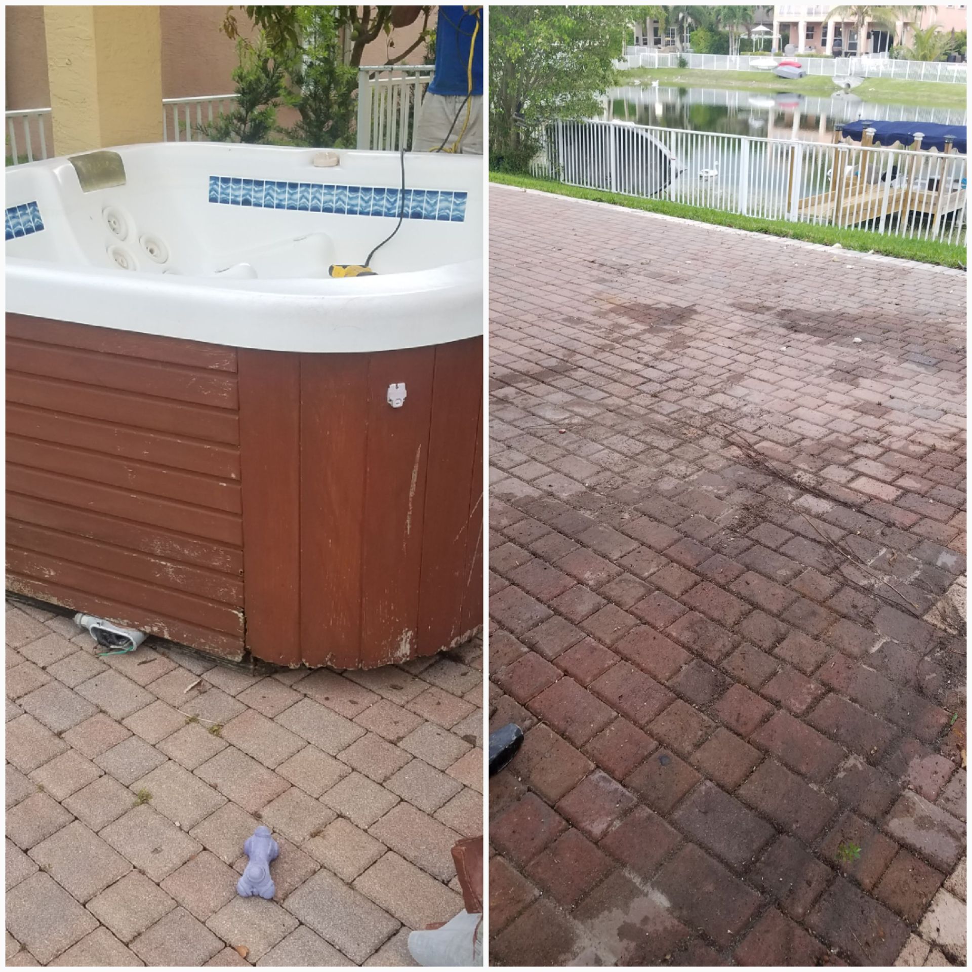 A hot tub on brick pavers, some stained. A body of water and building are in the distance.