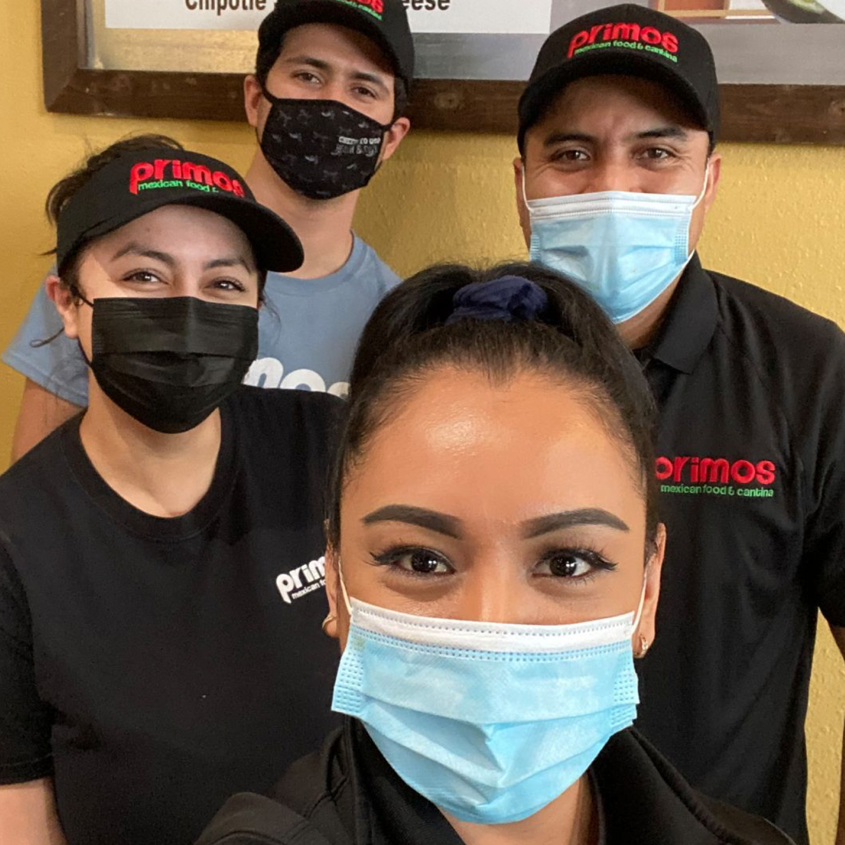A milkshake and tacos on a table at Primos restaurant. 