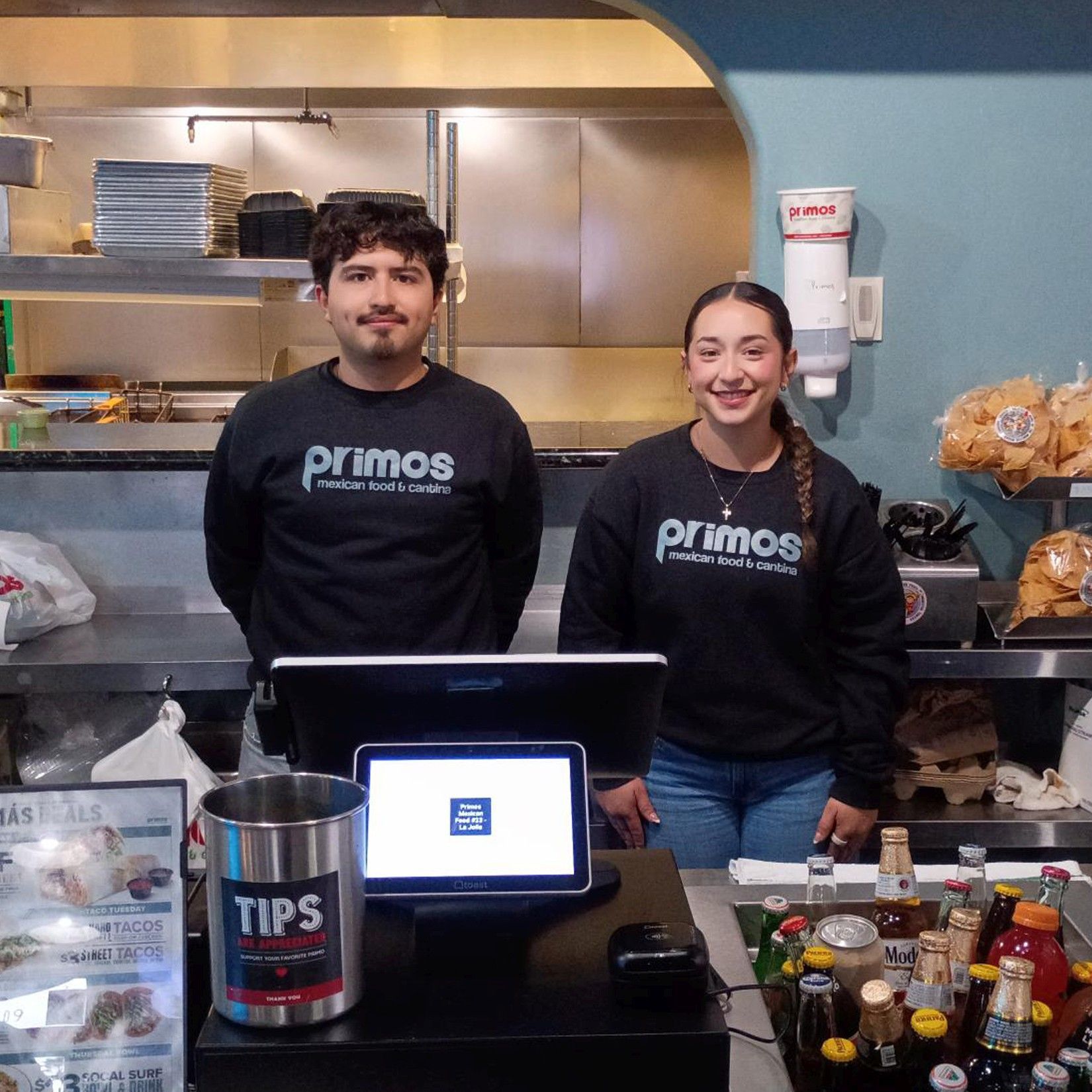 A milkshake and tacos on a table at Primos restaurant. 