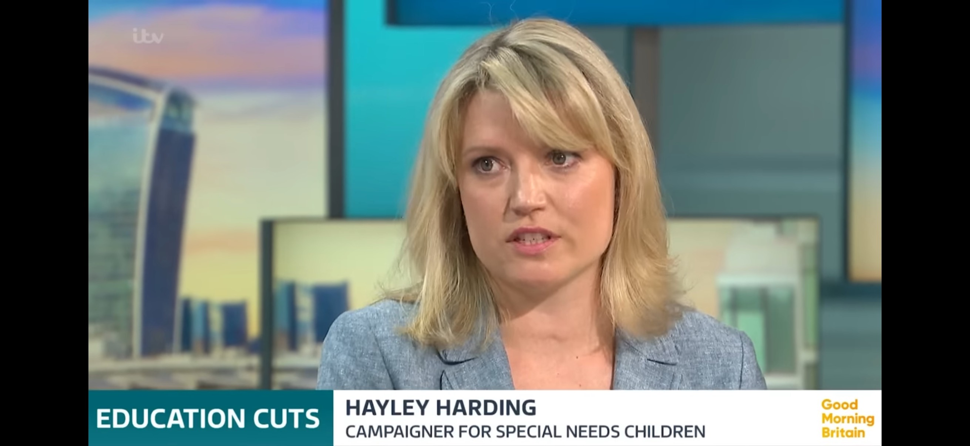 Hayley Harding discussing education cuts on TV. Blonde woman wearing a blue blazer.
