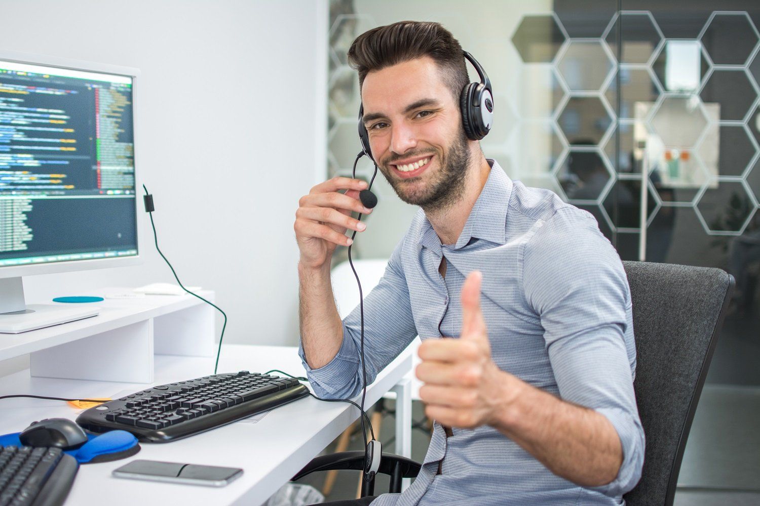 VoIP — Smiling Man Showing Thumb Up in Fair Oaks, CA