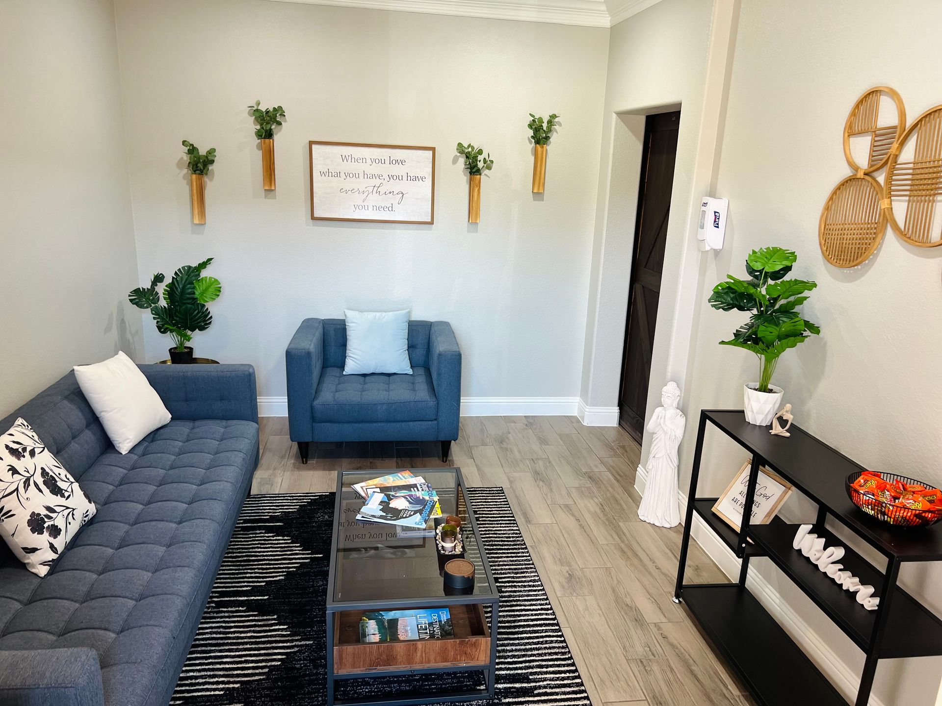 A woman is breathing fresh air in the woods.