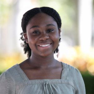 Medgine E. Present Headshot