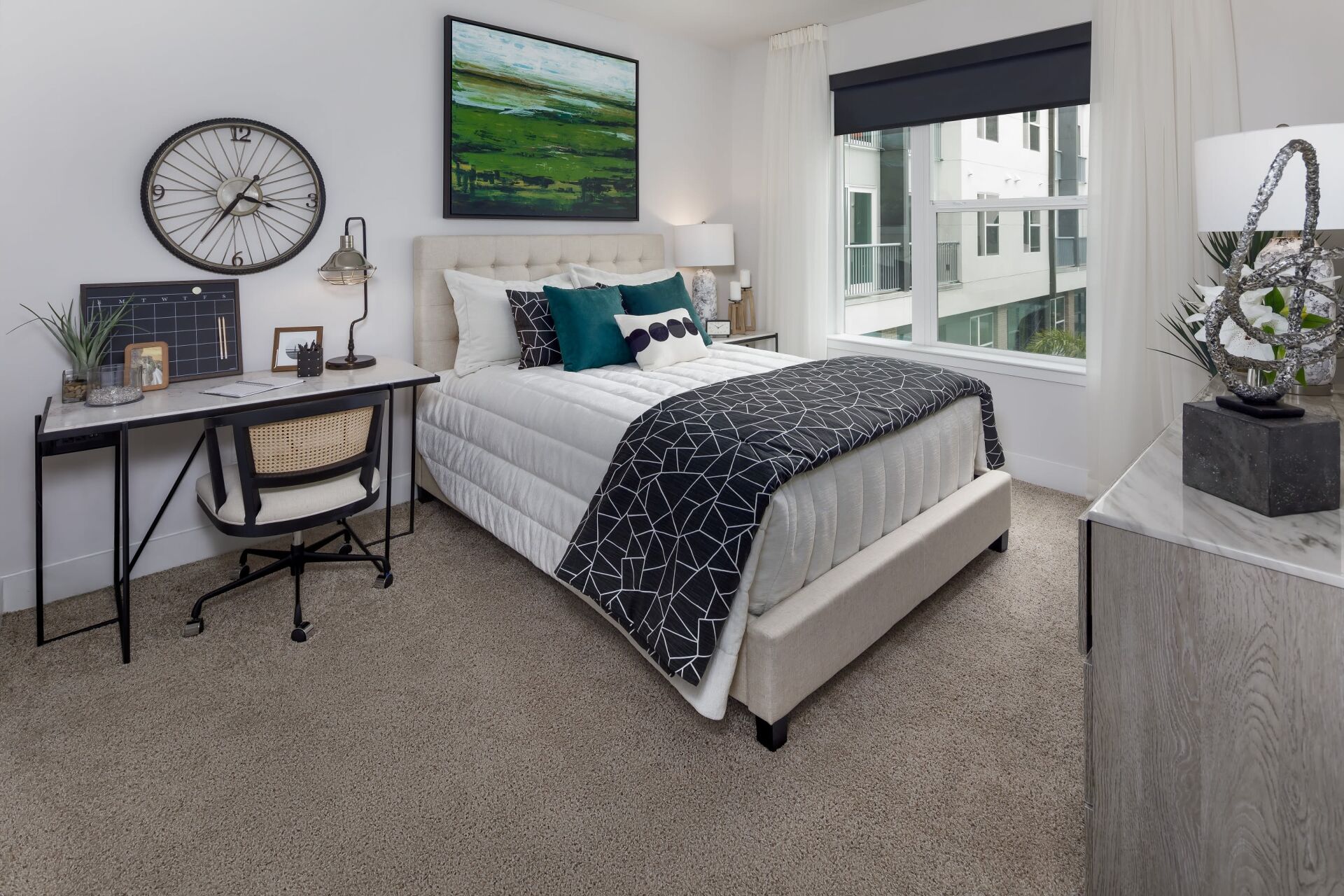 Central Station on Orange | Spacious Bedroom with a Working Area, Bed, and Large Window