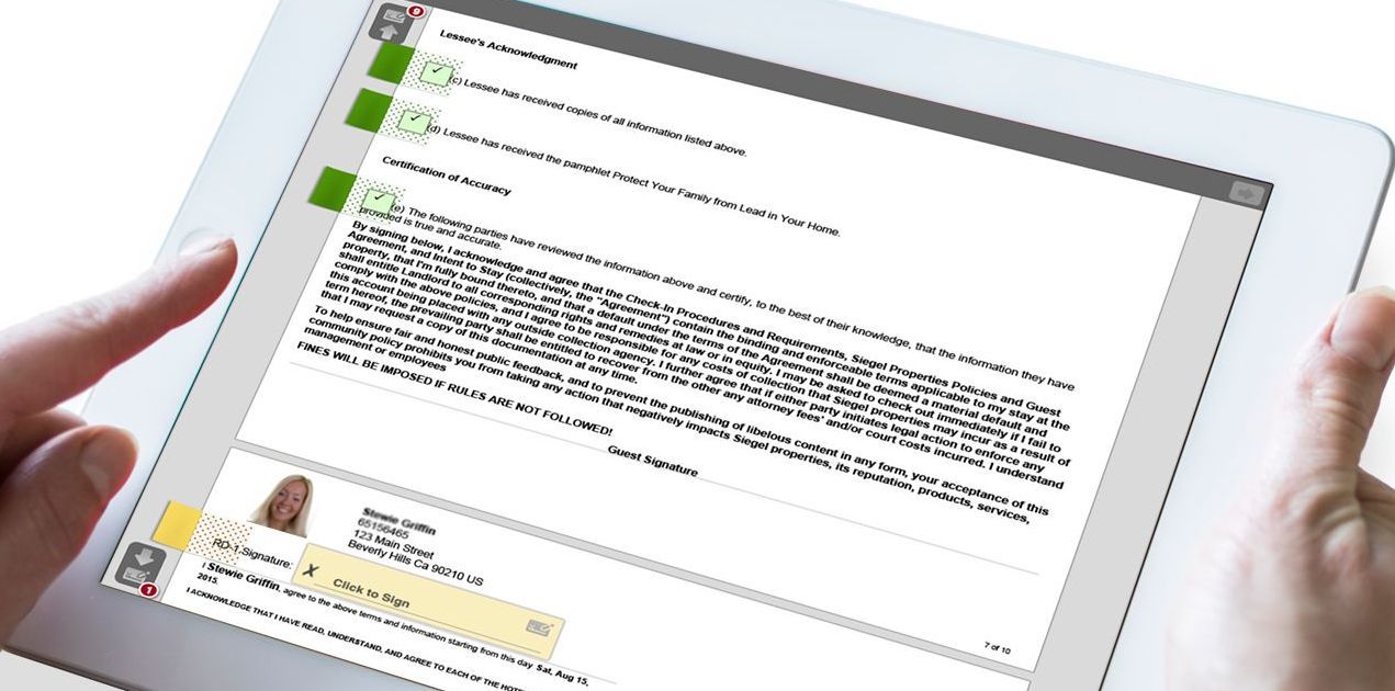 Hands holding a tablet displaying an email with a profile picture, green highlights.