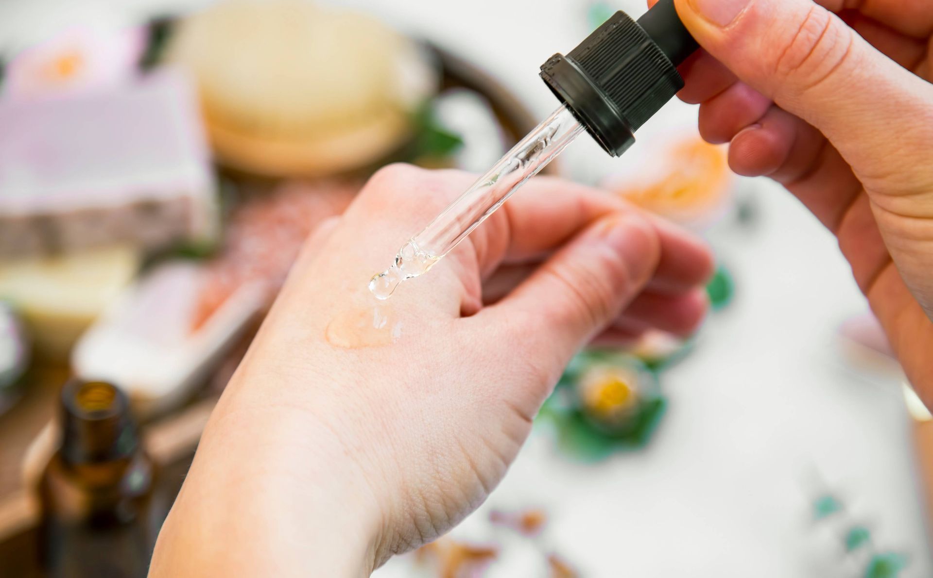 A Person Is Applying a Dropper to Their Hand | Ballarat, VIC | Building Health Naturopathy