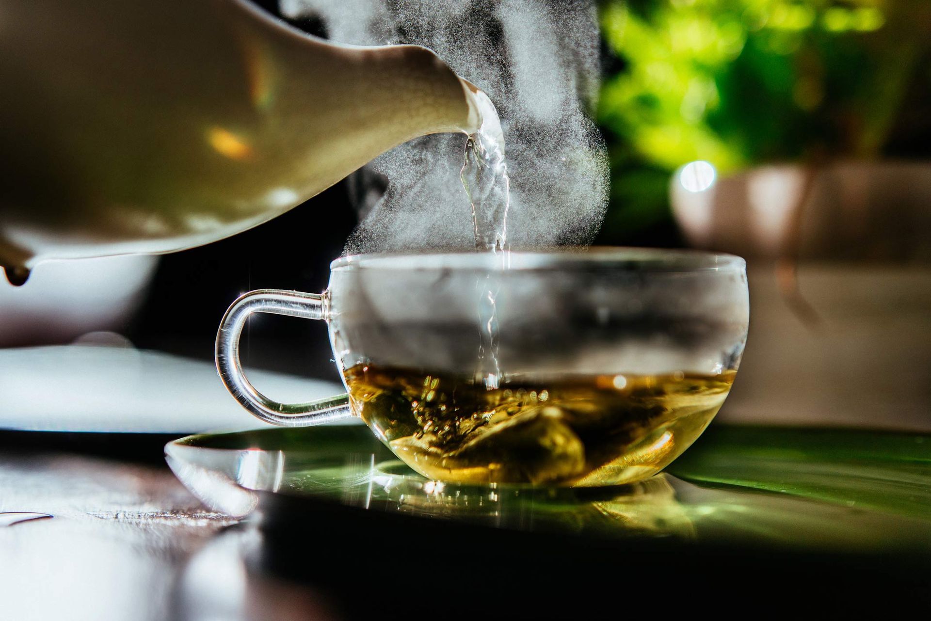 A Cup of Tea Is Being Poured from A Teapot Into a Glass Cup | Ballarat, VIC | Building Health Naturopathy