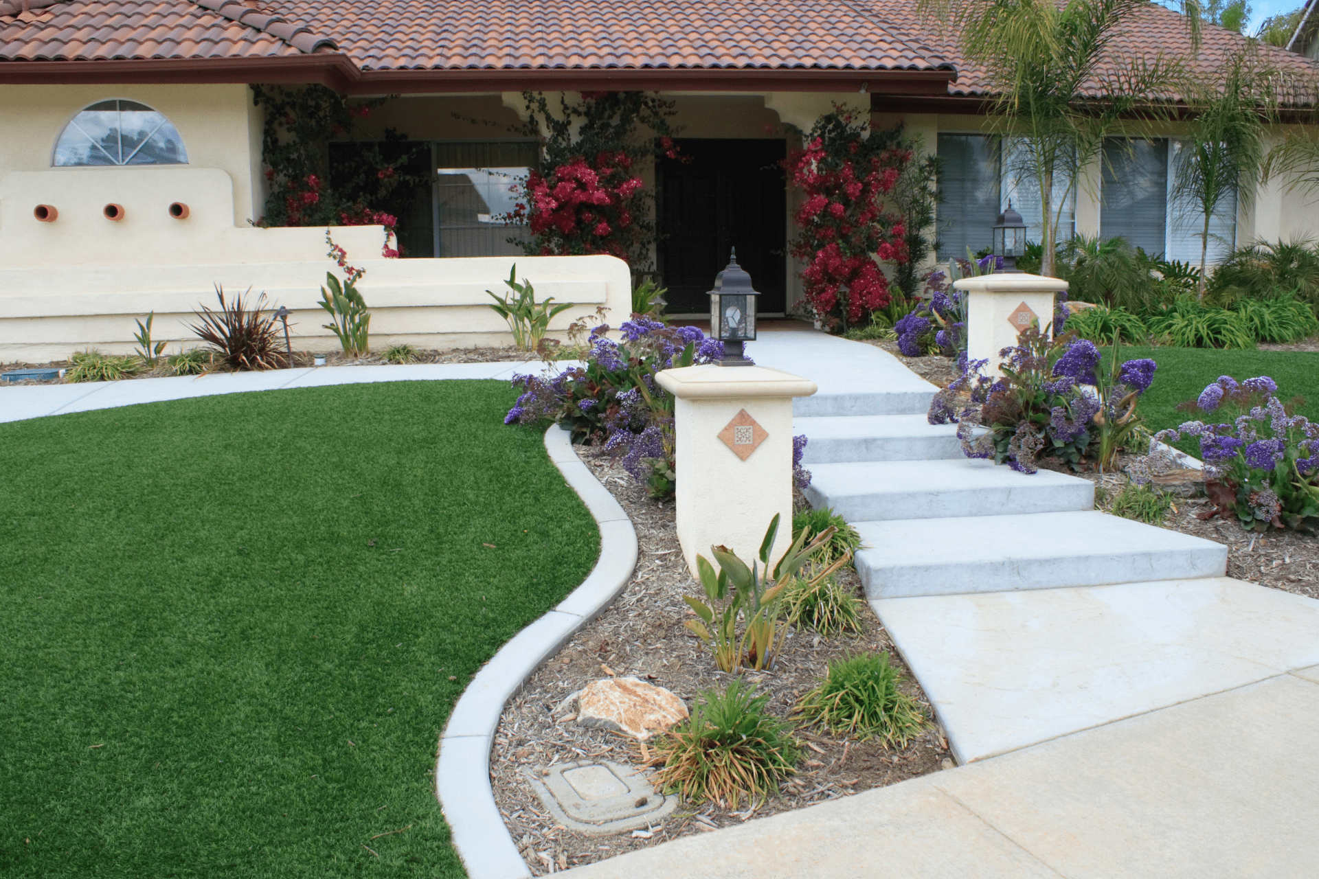 Artificial turf in a front yard in Boise landscaped by Boise Landscaping Company