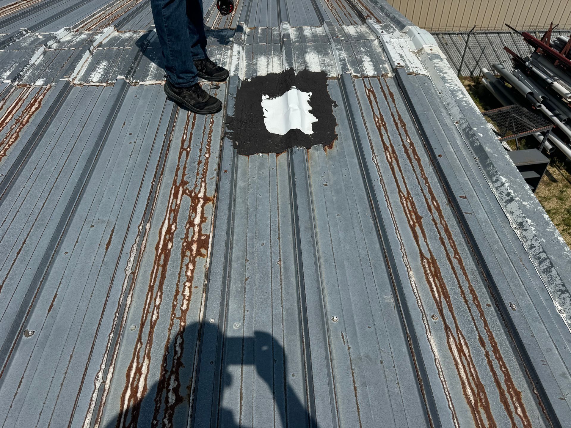 old roof getting inspected in Madison, Wisconsin