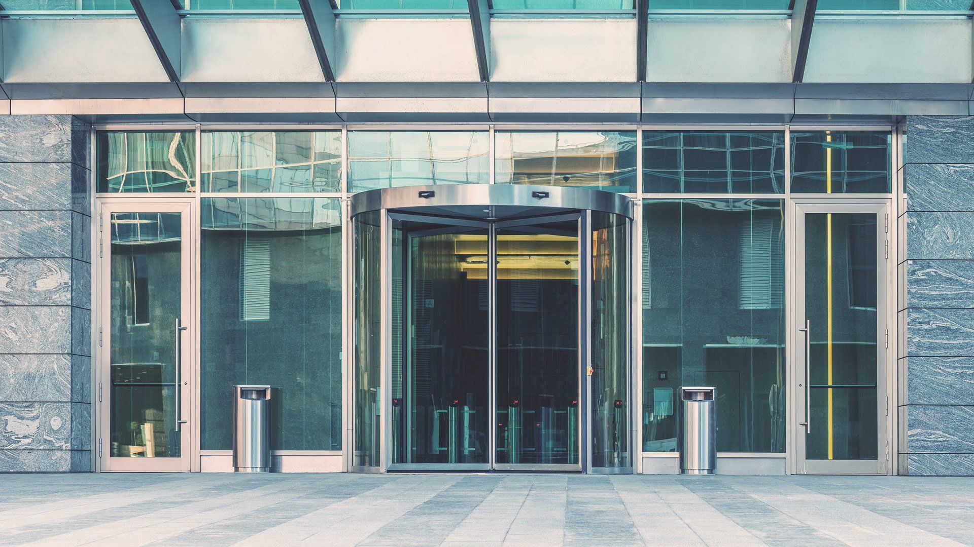 Glass Walls — Commercial Building With New Glass Walls And Glass Door In Pompano Beach, FL Glass Walls — Commercial Building With New Glass Walls And Glass Door In Pompano Beach, FL