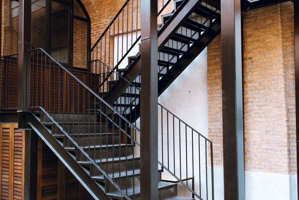  Black Railings And Support Beams Inside A Building — Soward Steel & Aluminium Fabrication in South Lismore, NSW