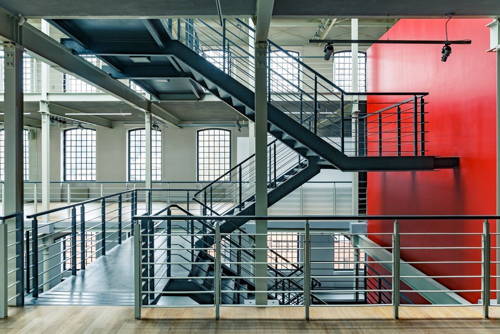 Metal Staircase In A Modern Building — Soward Steel & Aluminium Fabrication in South Lismore, NSW