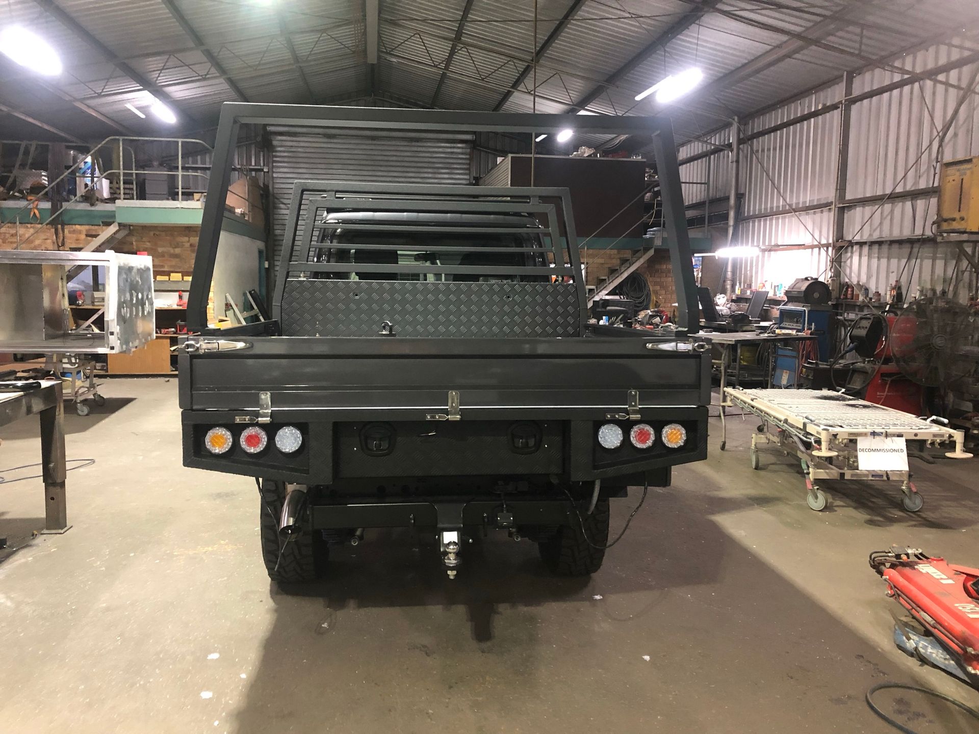 Black Truck Tray With Metal Frame In A Workshop — Soward Steel & Aluminium Fabrication in South Lismore, NSW