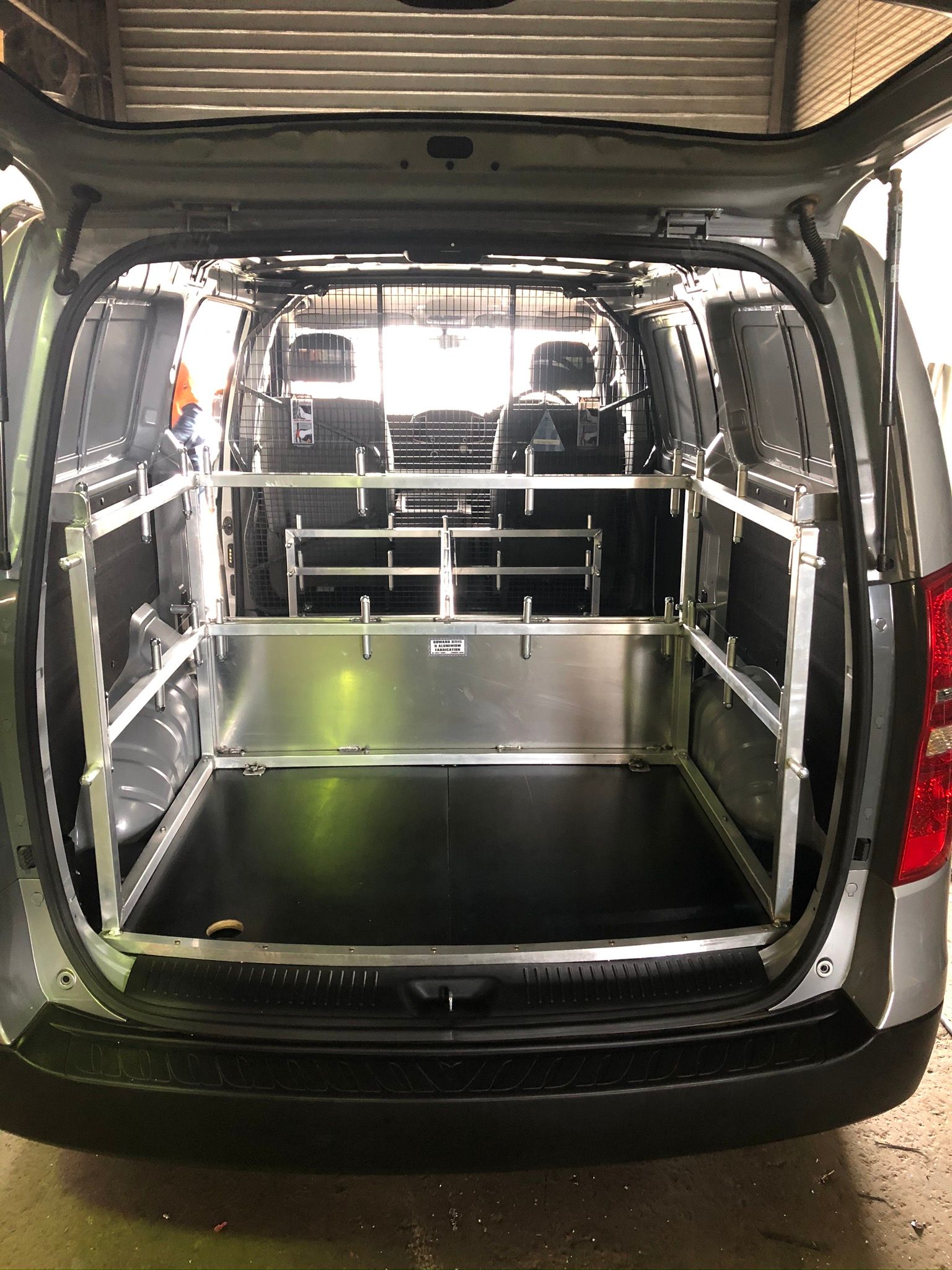 Inside View Of A Cargo Van With Metal Shelving — Soward Steel & Aluminium Fabrication in South Lismore, NSW