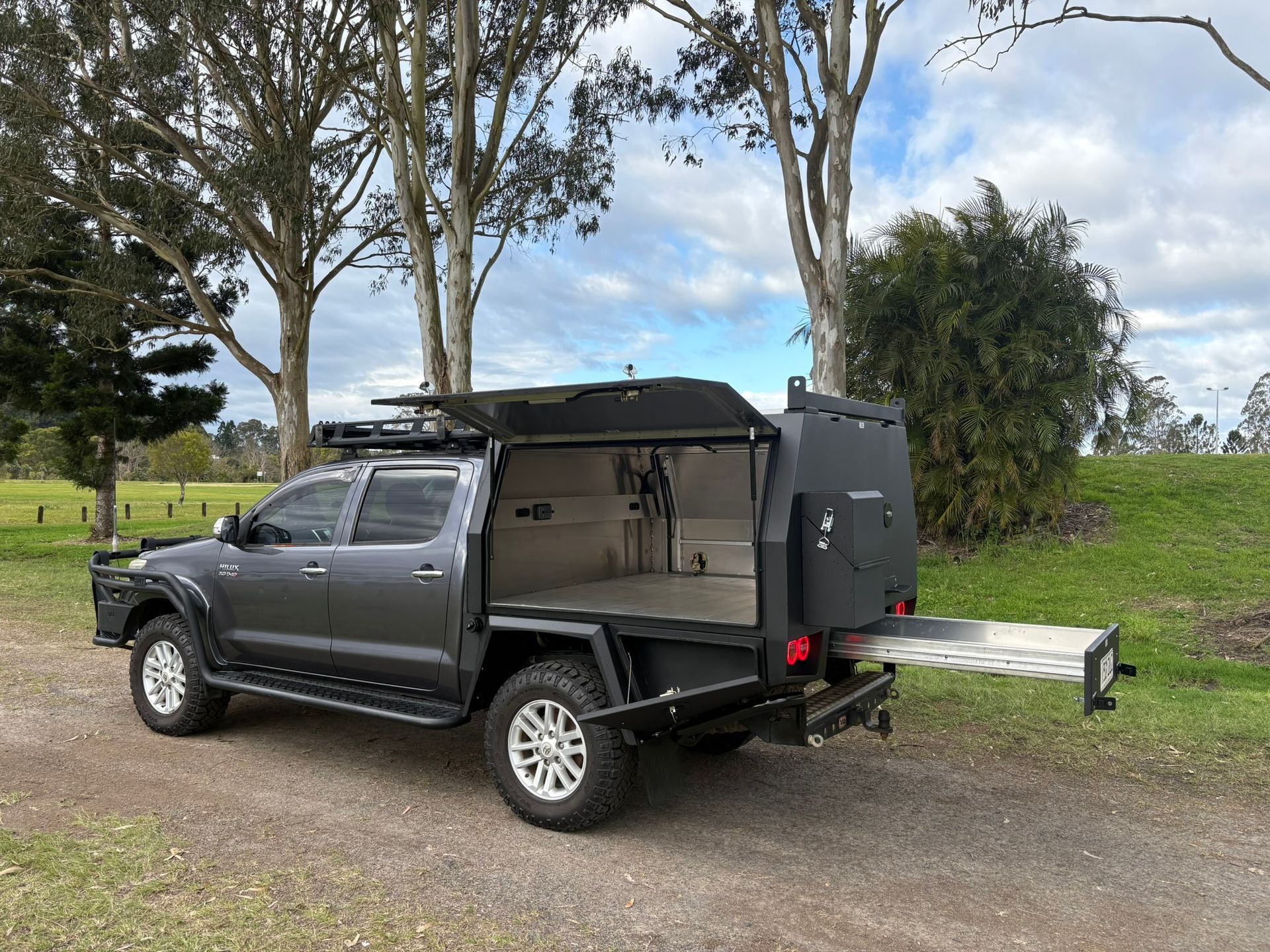Truck With A Modified Bed, Open Rear, And A Slide-out Tray — Soward Steel & Aluminium Fabrication in South Lismore, NSW