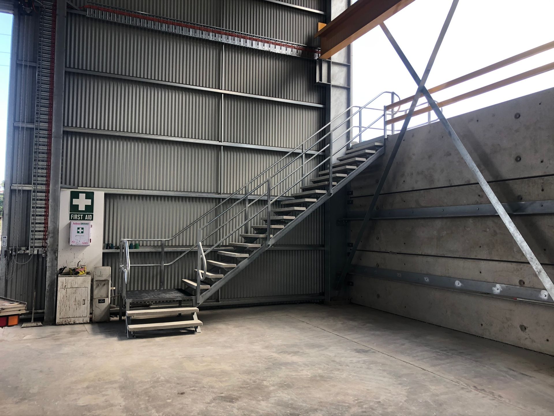 Metal Staircase Leading Up to an Industrial Structure — Soward Steel & Aluminium Fabrication in South Lismore, NSW