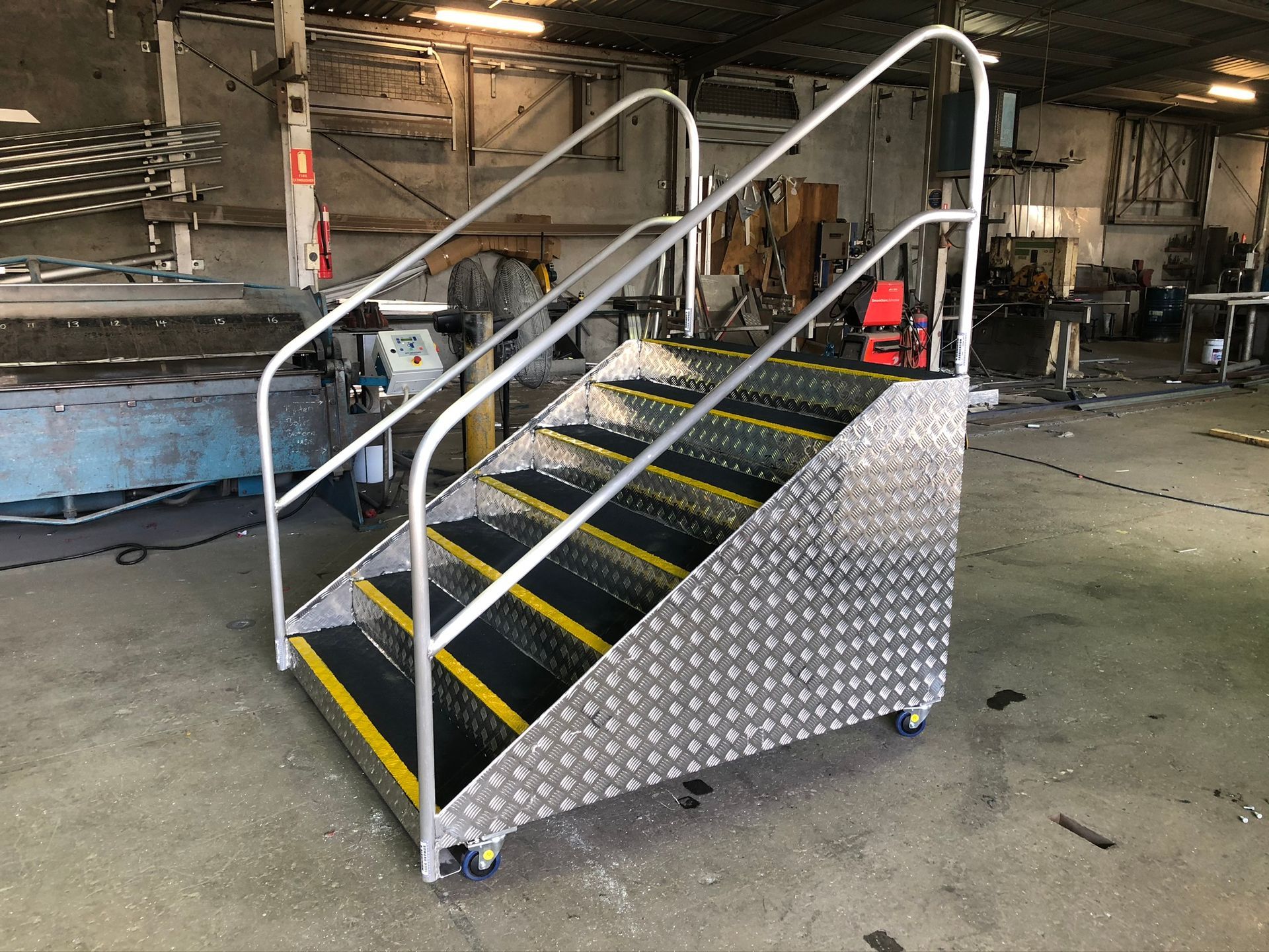 Aluminum Diamond-plate Mobile Staircase With Handrails — Soward Steel & Aluminium Fabrication in South Lismore, NSW