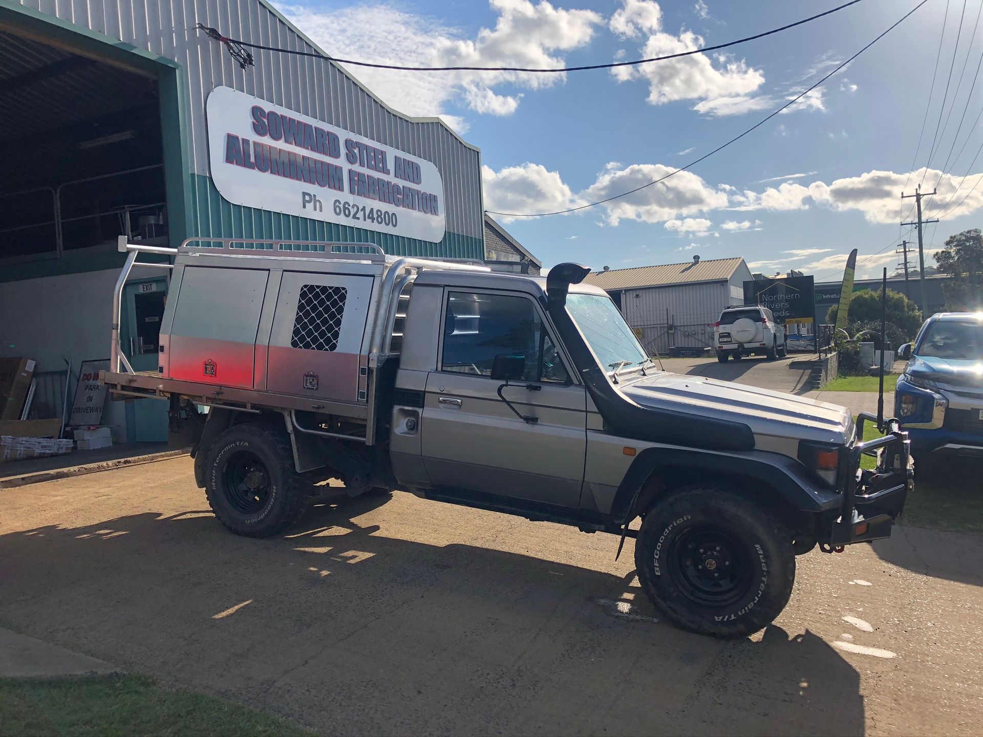 Silver Pickup Truck With A Custom Flatbed And Canopy — Soward Steel & Aluminium Fabrication in South Lismore, NSW