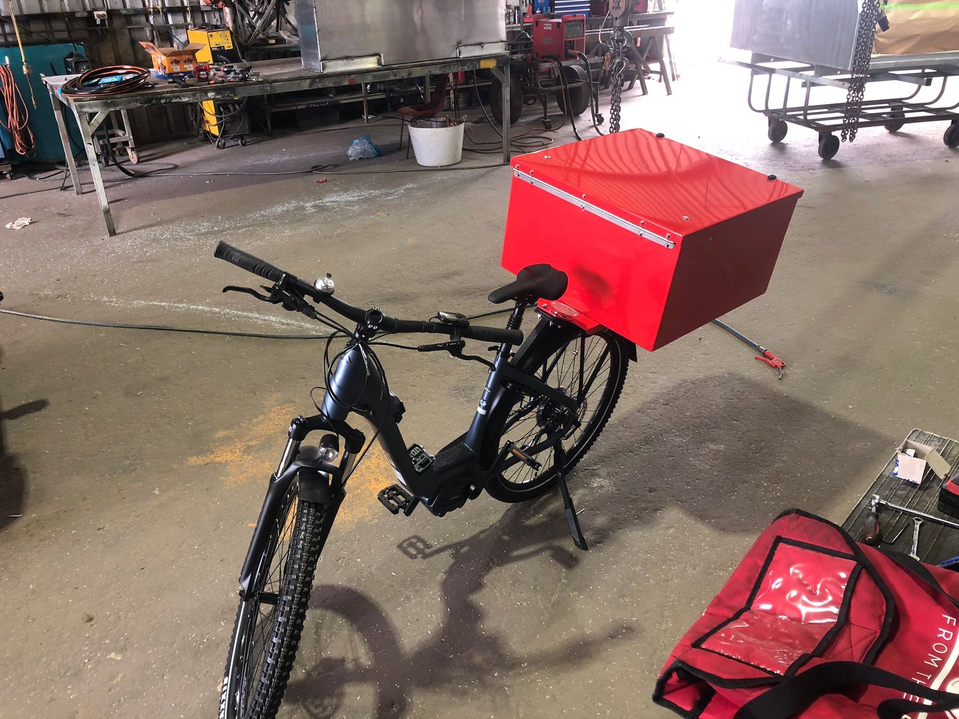 Black Delivery Bicycle With A Large Red Box On The Rear Rack — Soward Steel & Aluminium Fabrication in South Lismore, NSW