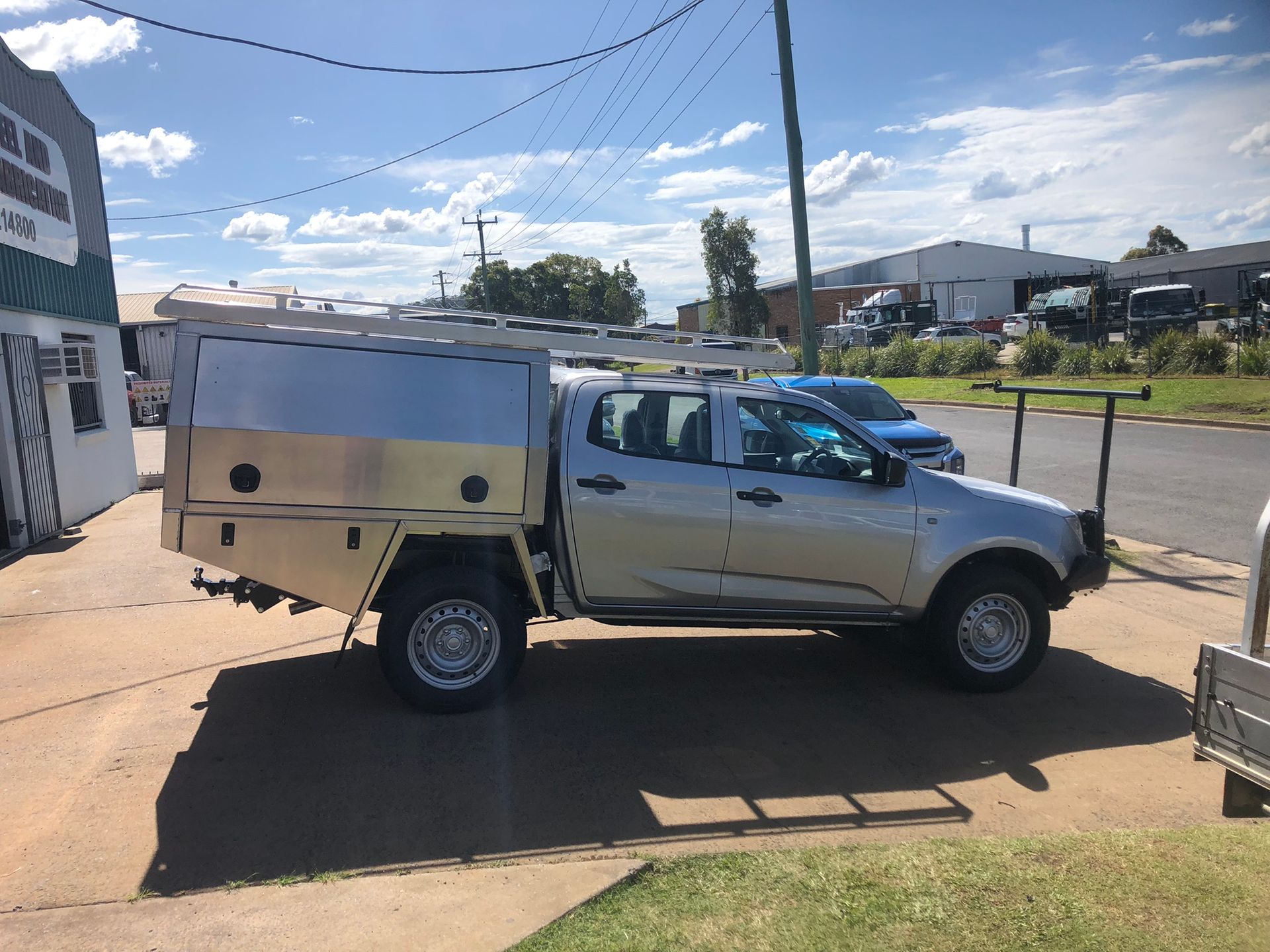 Silver Pickup Truck With A Custom Storage Canopy And Ladder Rack — Soward Steel & Aluminium Fabrication in South Lismore, NSW