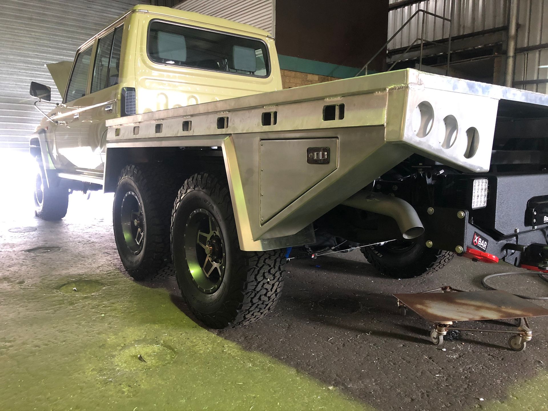 Tan 6x6 Truck With Custom Aluminum Flatbed — Soward Steel & Aluminium Fabrication in South Lismore, NSW