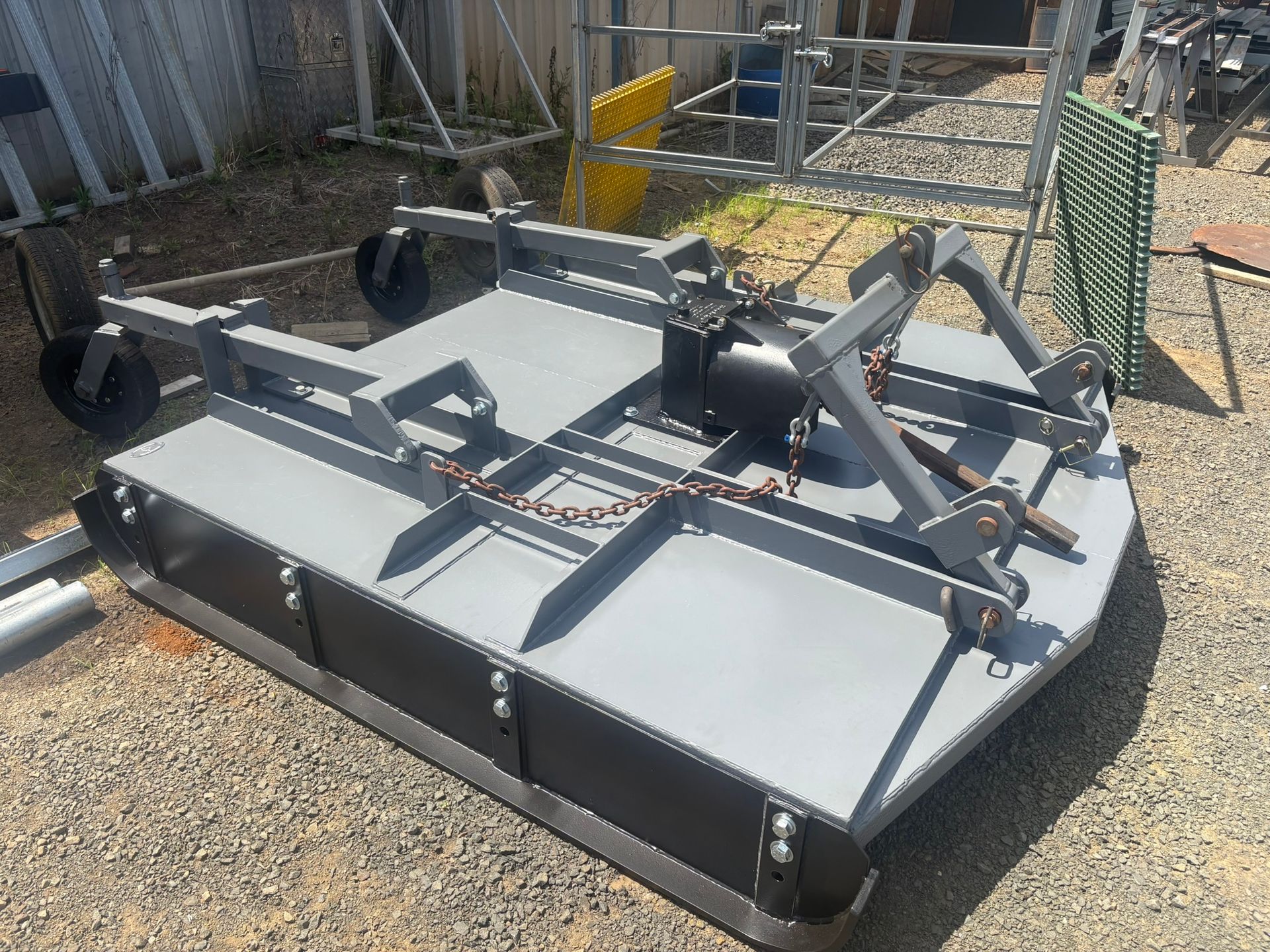 Gray Tow Bed On Gravel With Wheels — Soward Steel & Aluminium Fabrication in South Lismore, NSW