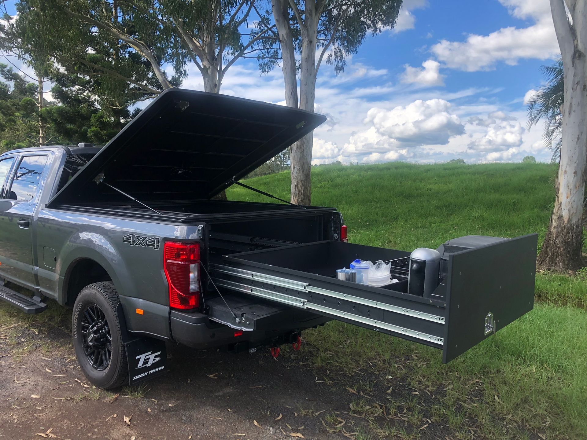 Gray Pickup Truck With Black Bed Slide Extended — Soward Steel & Aluminium Fabrication in South Lismore, NSW