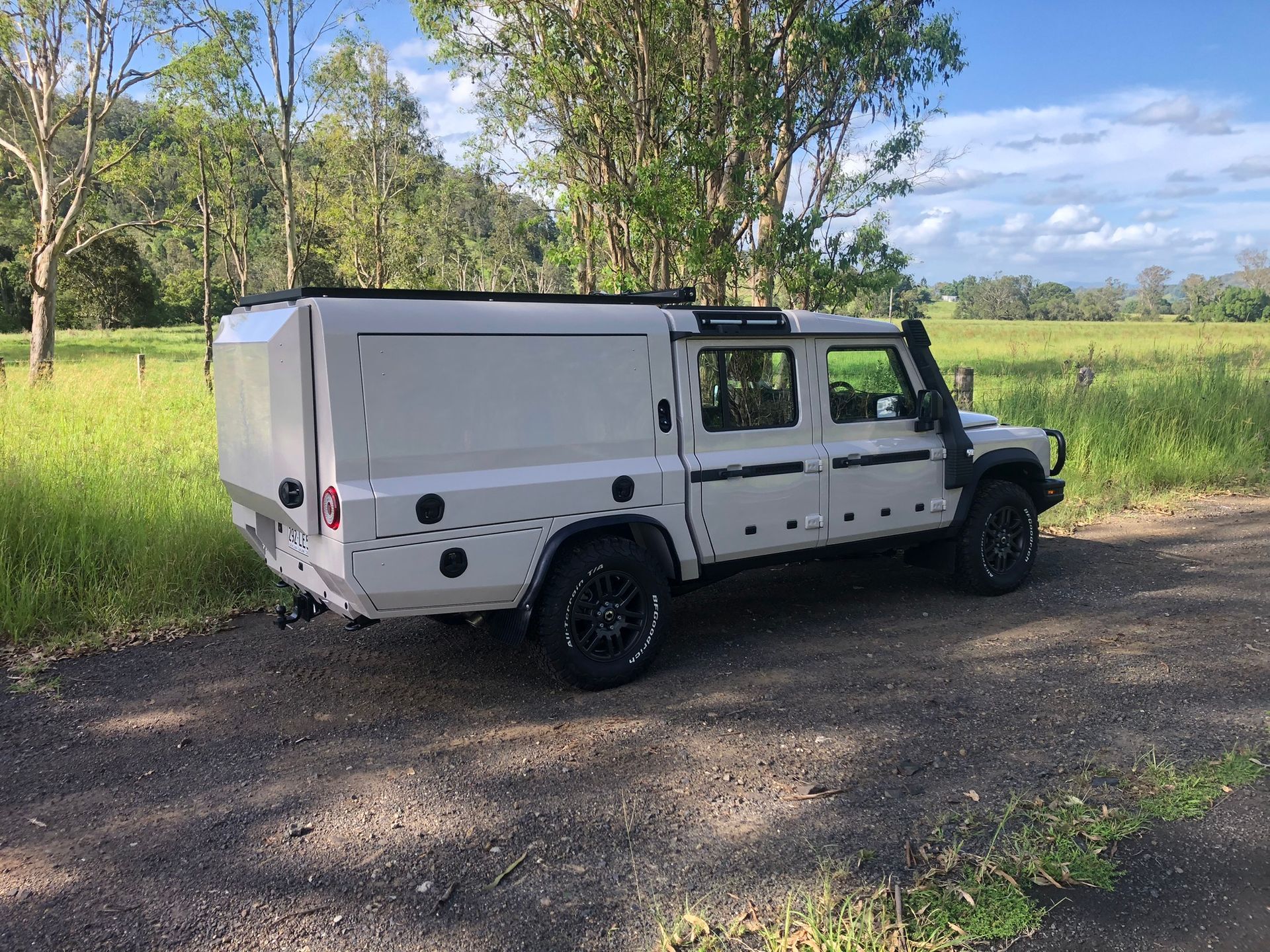 White Off-road Vehicle With A Camper Shell Parked On A Dirt Road — Soward Steel & Aluminium Fabrication in South Lismore, NSW