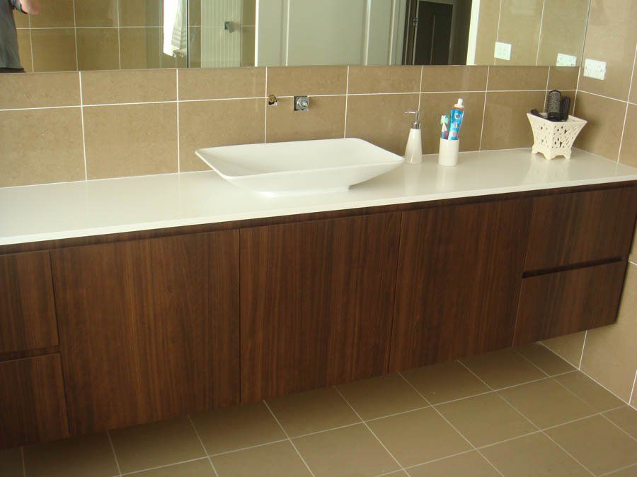 dark wooden bathroom vanity