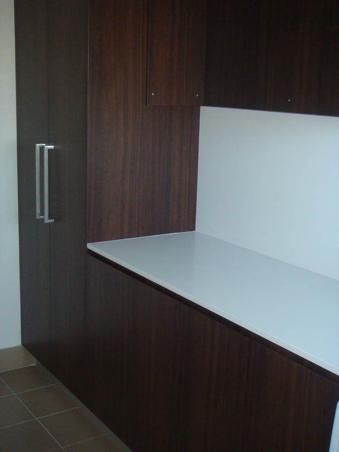 wooden laundry cupboards