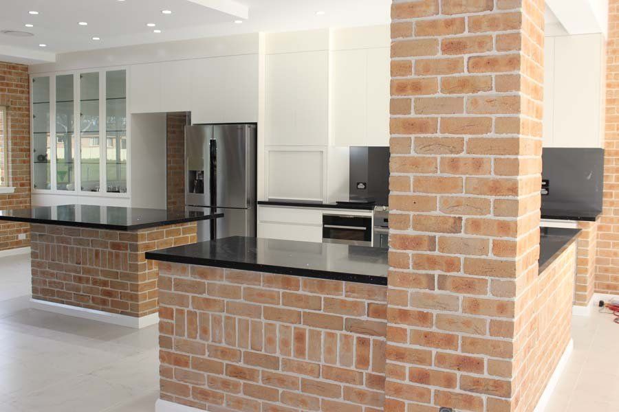 contemporary kitchen with brick accents