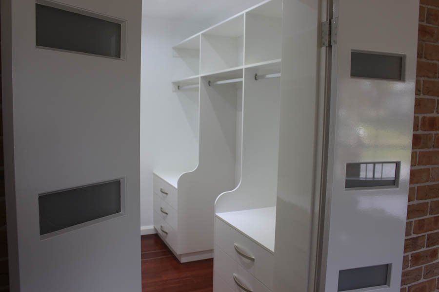 walk in closet white drawers and shelves