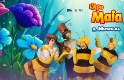 I membri del cast, vestiti da api e insetti, si esibiscono sul palco per L'Ape Maia, Il Musical, con uno sfondo floreale colorato.
