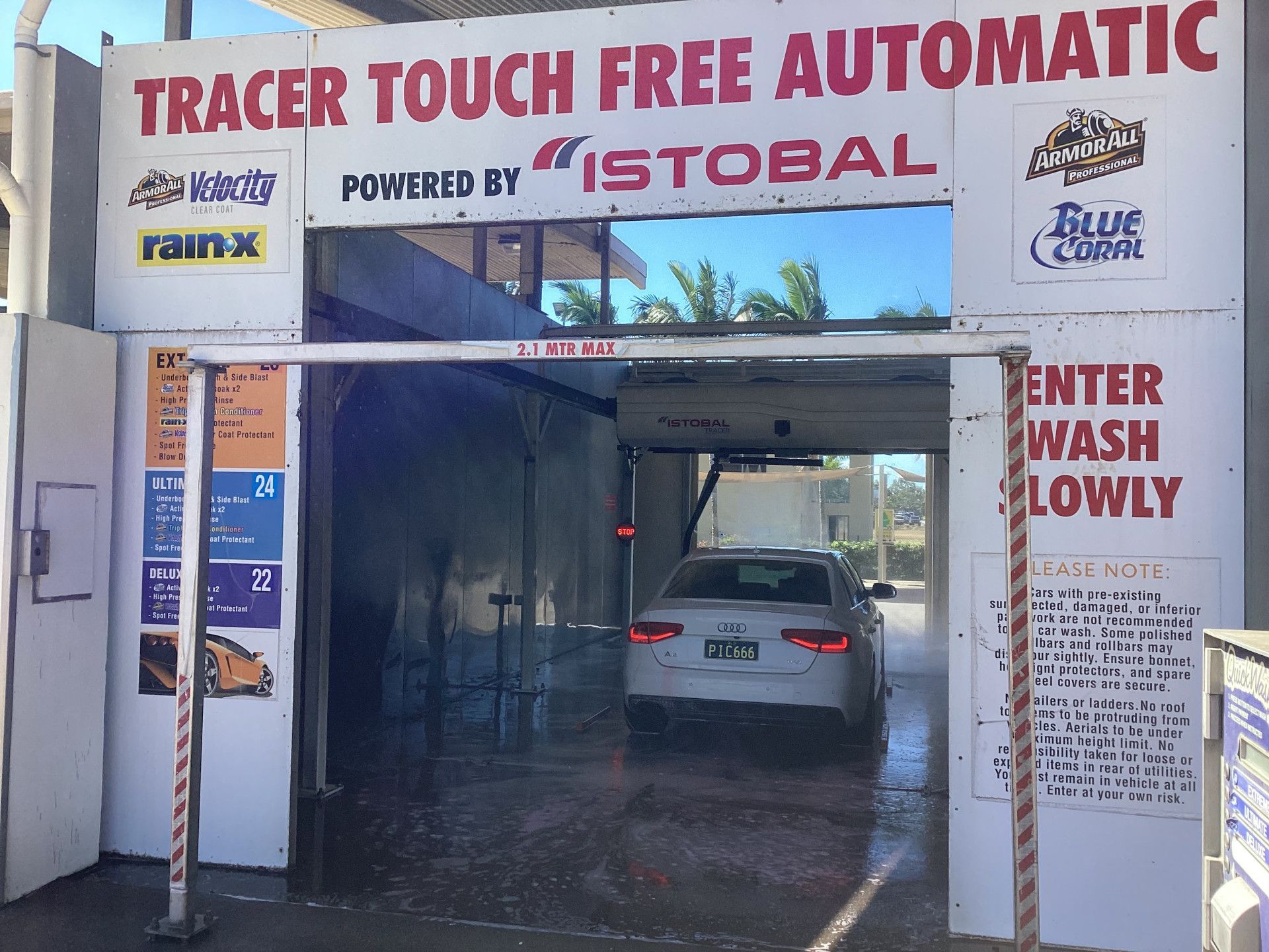 A Car Is Being Washed in a Automatic Washer — Whitsunday Wash In Bowen, QLD
