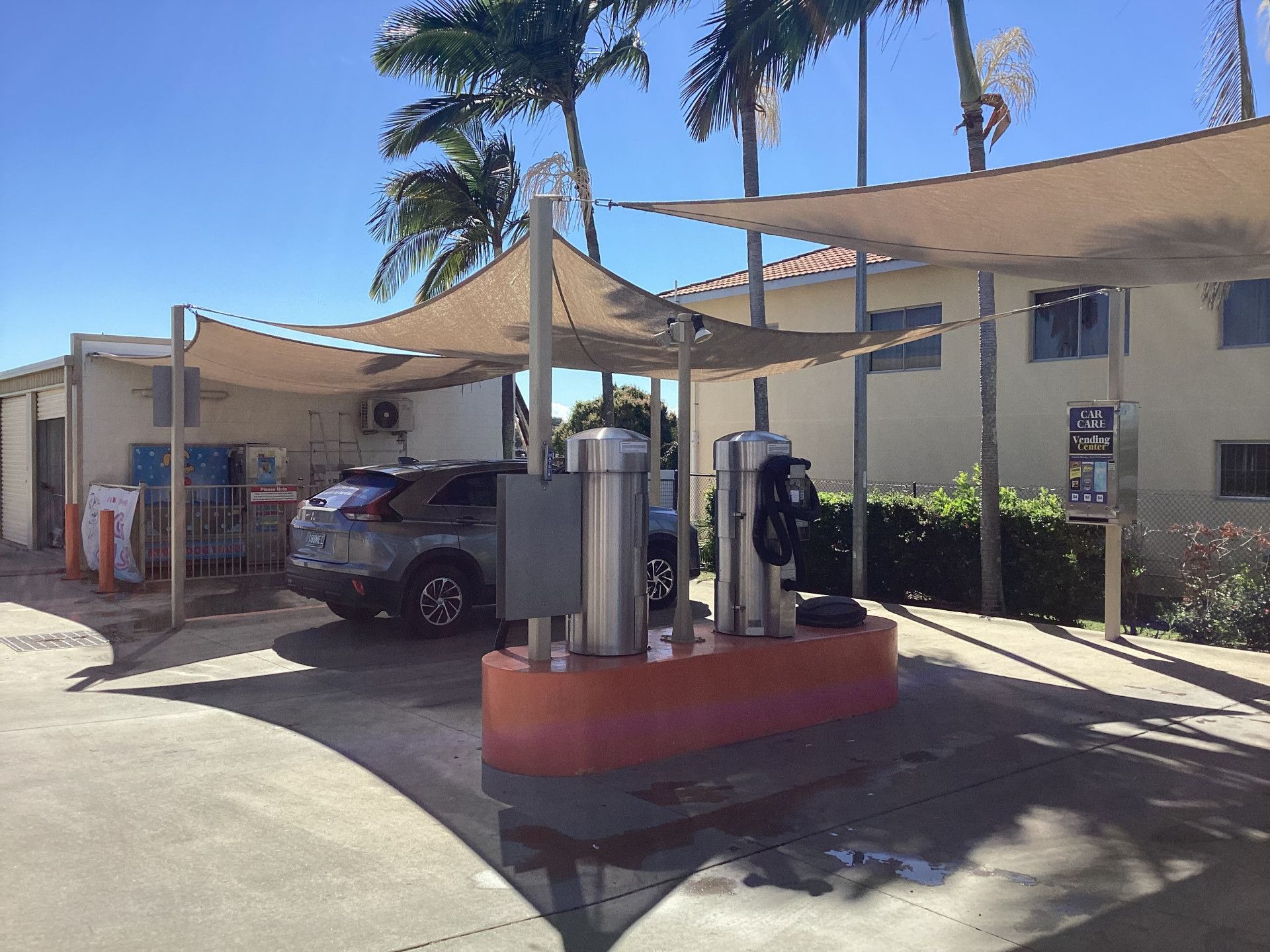 A View of A Parking Lot from Inside a Building — Whitsunday Wash In Bowen, QLD
