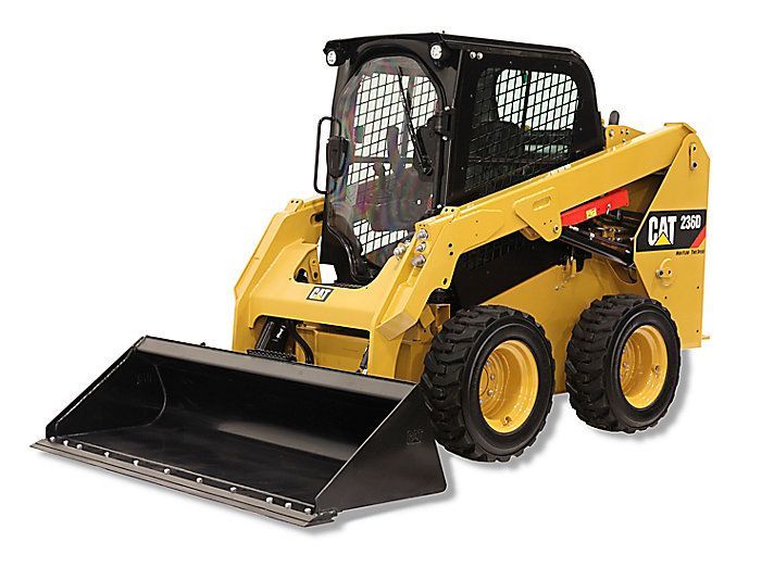 A yellow cat skid steer with a black bucket on a white background