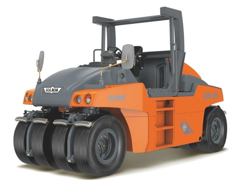 A large orange and gray vehicle with the word wow on the side