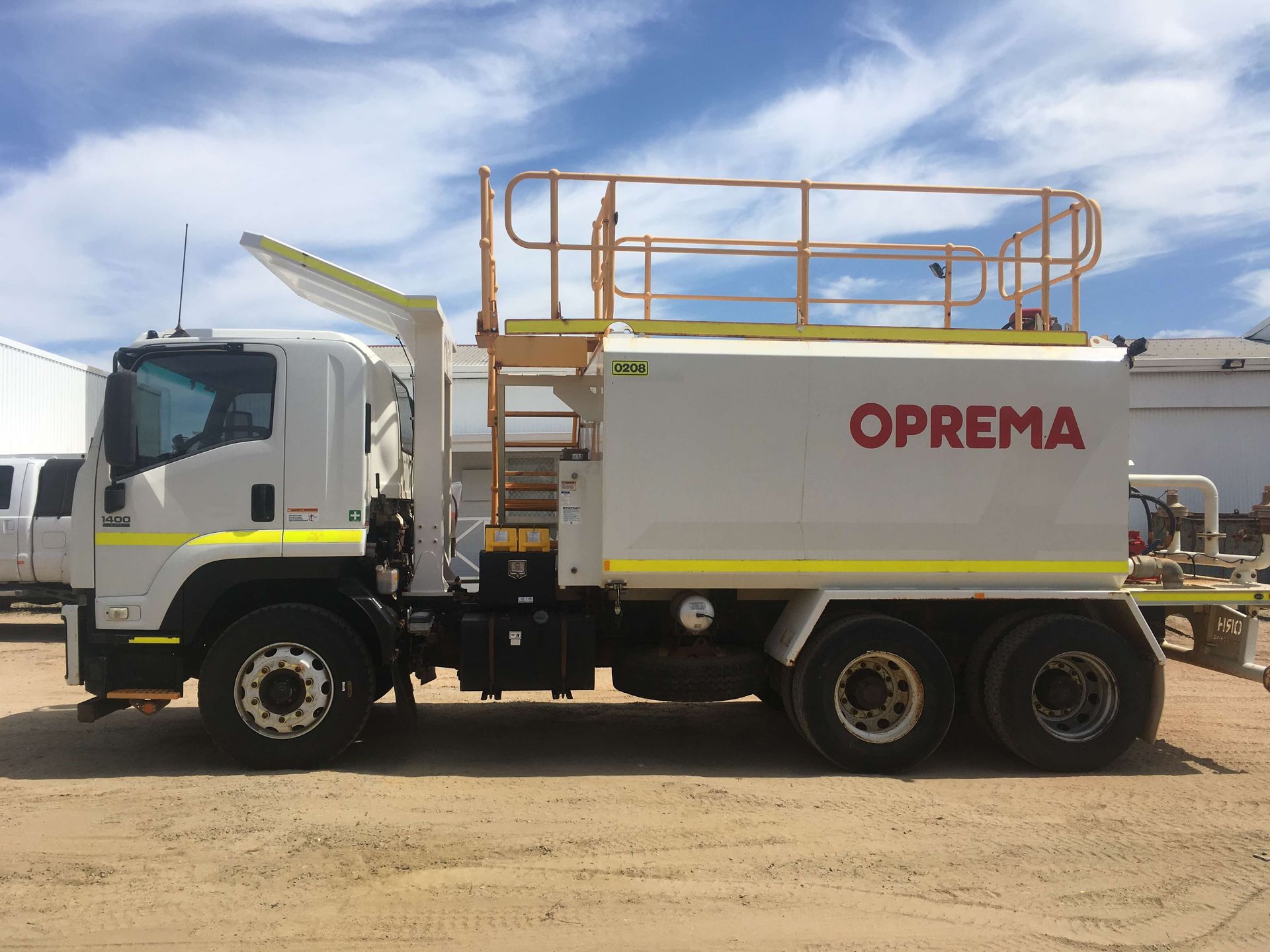 A white truck with the word oprema on the side