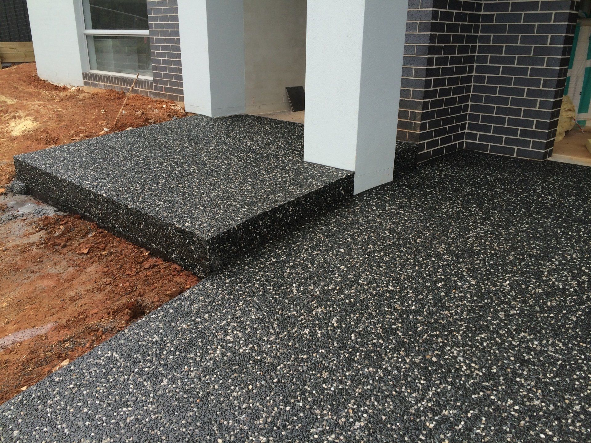 Concrete Aggregate Driveway — Stamped Concrete Patio Floor — Concreters in Port Macquarie, NSW Concrete Aggregate Driveway— Stamped Concrete Patio Floor — Concreters in Port Macquarie, NSW