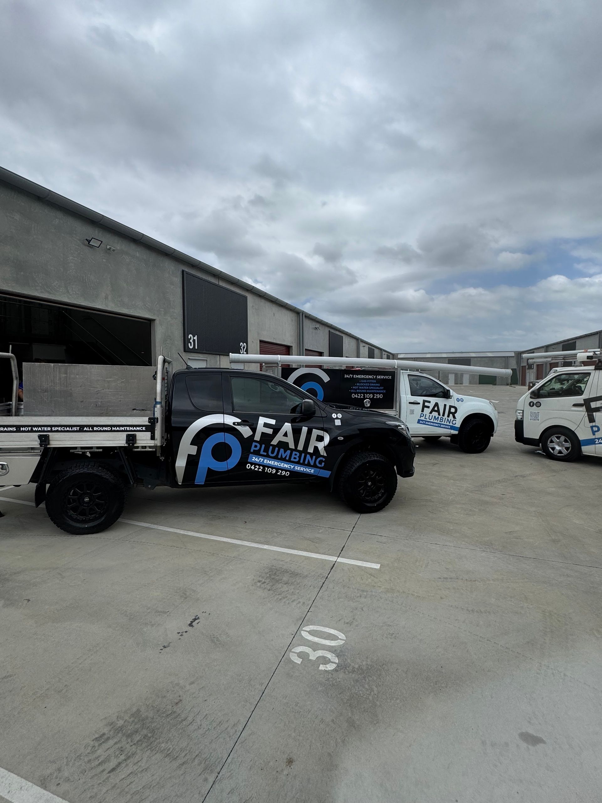 Three work trucks with