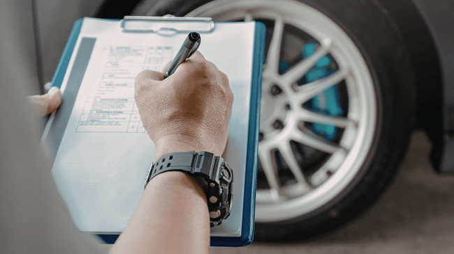 a mechanic doing a pre-purchase inspection