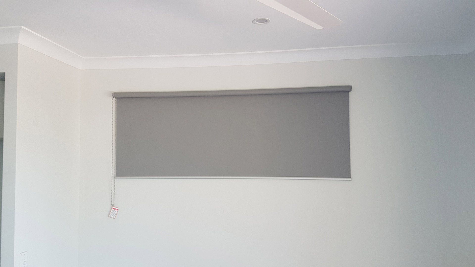 Gray Roller Blinds — Blinds Installation in Winnellie, NT