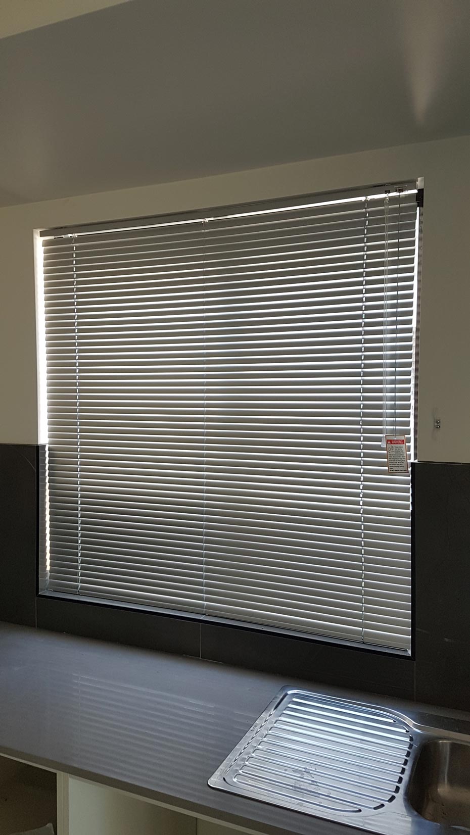 Venetian Blinds On Kitchen Area — Blinds Installation in Winnellie, NT