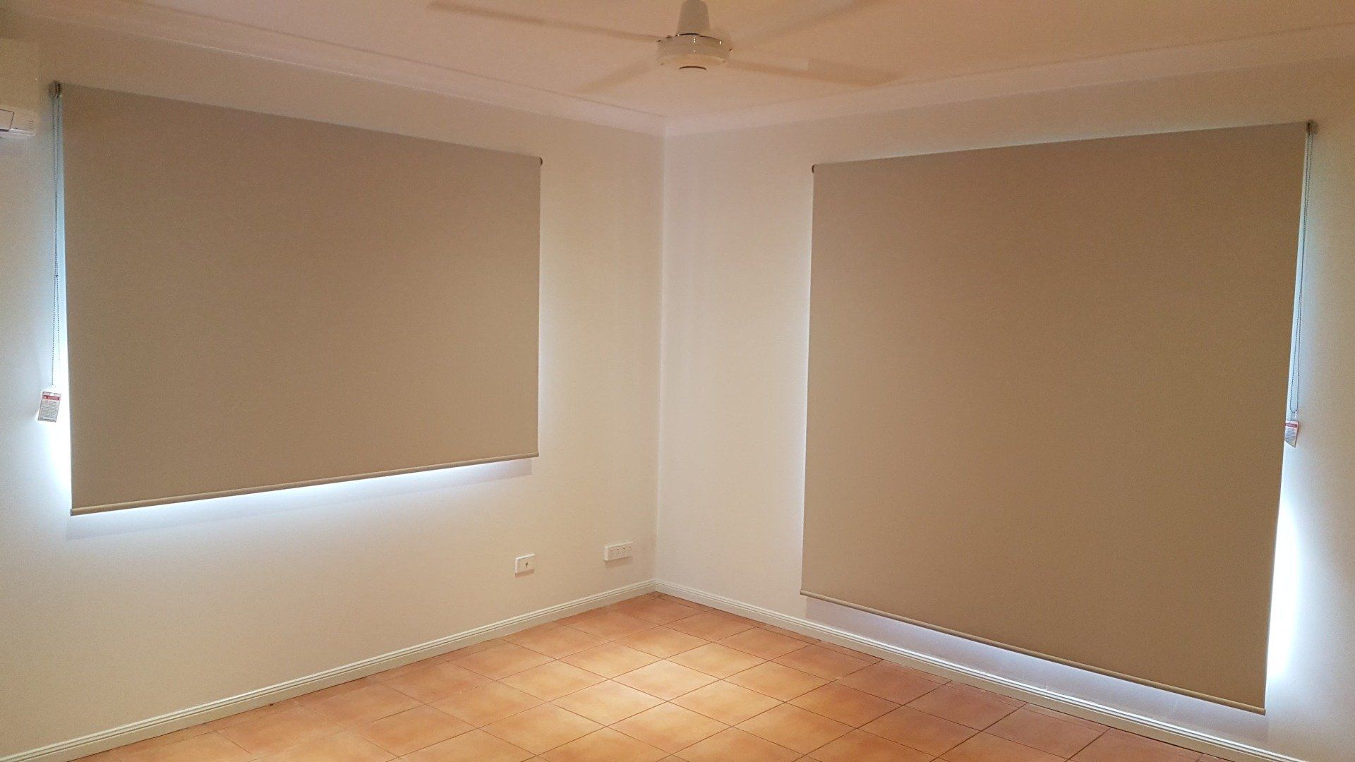 Cream coloured Roller Blinds — Blinds Installation in Winnellie, NT