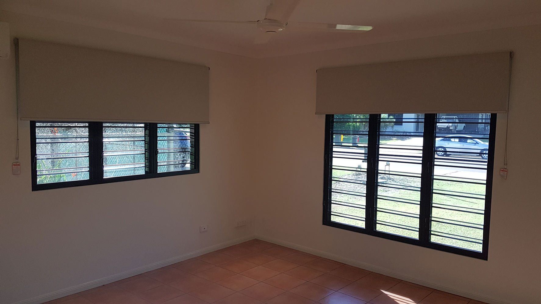 Jalousie Windows In Room With Ceiling Fan — Blinds Installation in Winnellie, NT