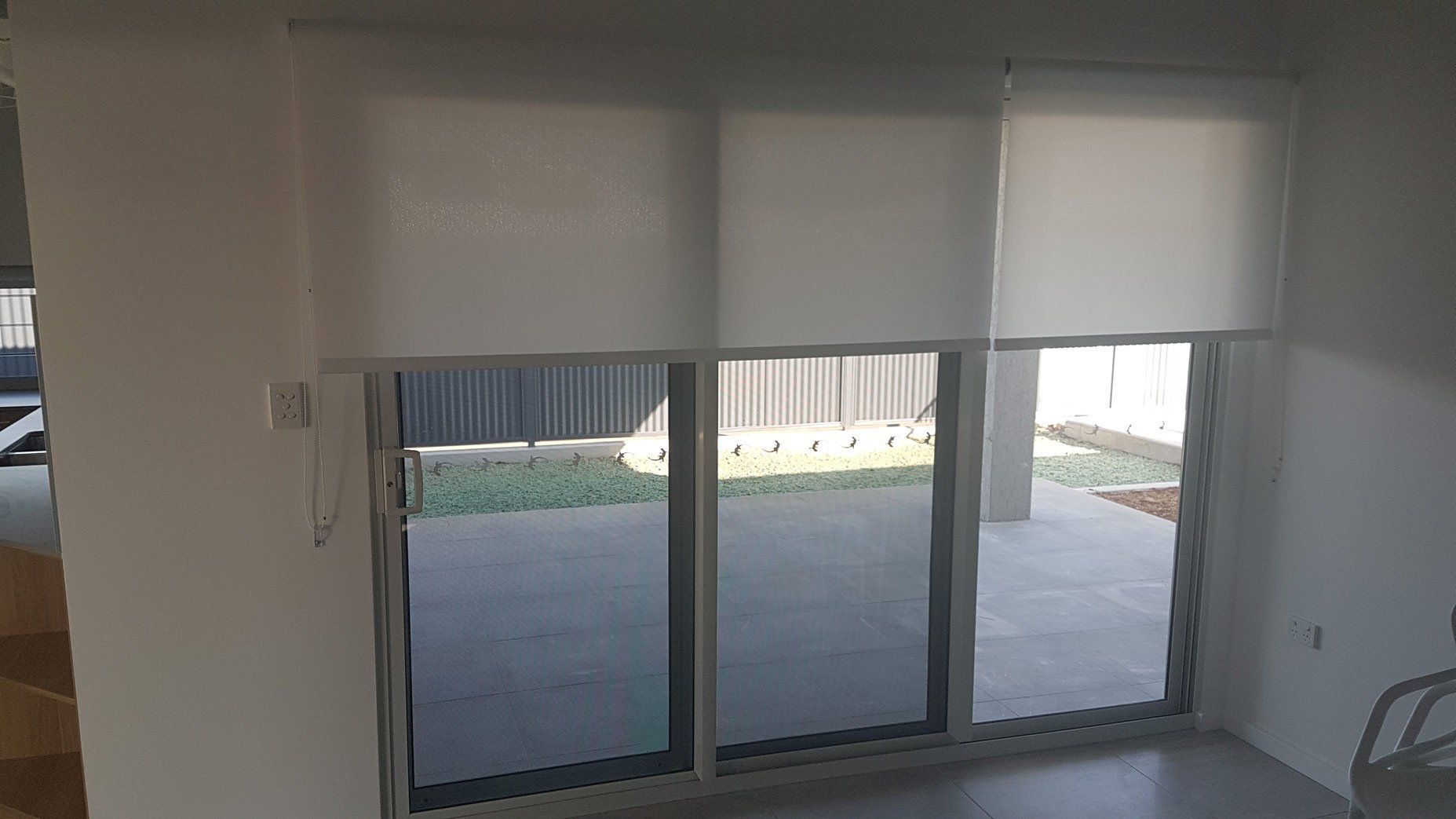 Sliding Doors With Aluminium White Frames — Blinds Installation in Winnellie, NT