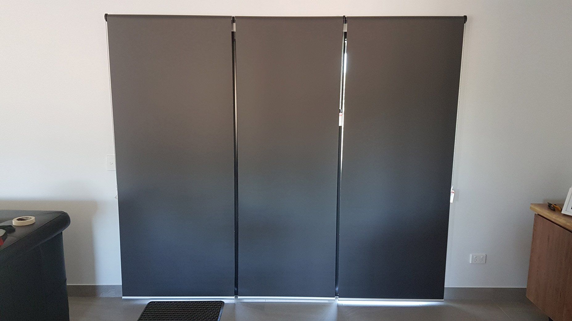 Black Roller Blinds — Blinds Installation in Winnellie, NT